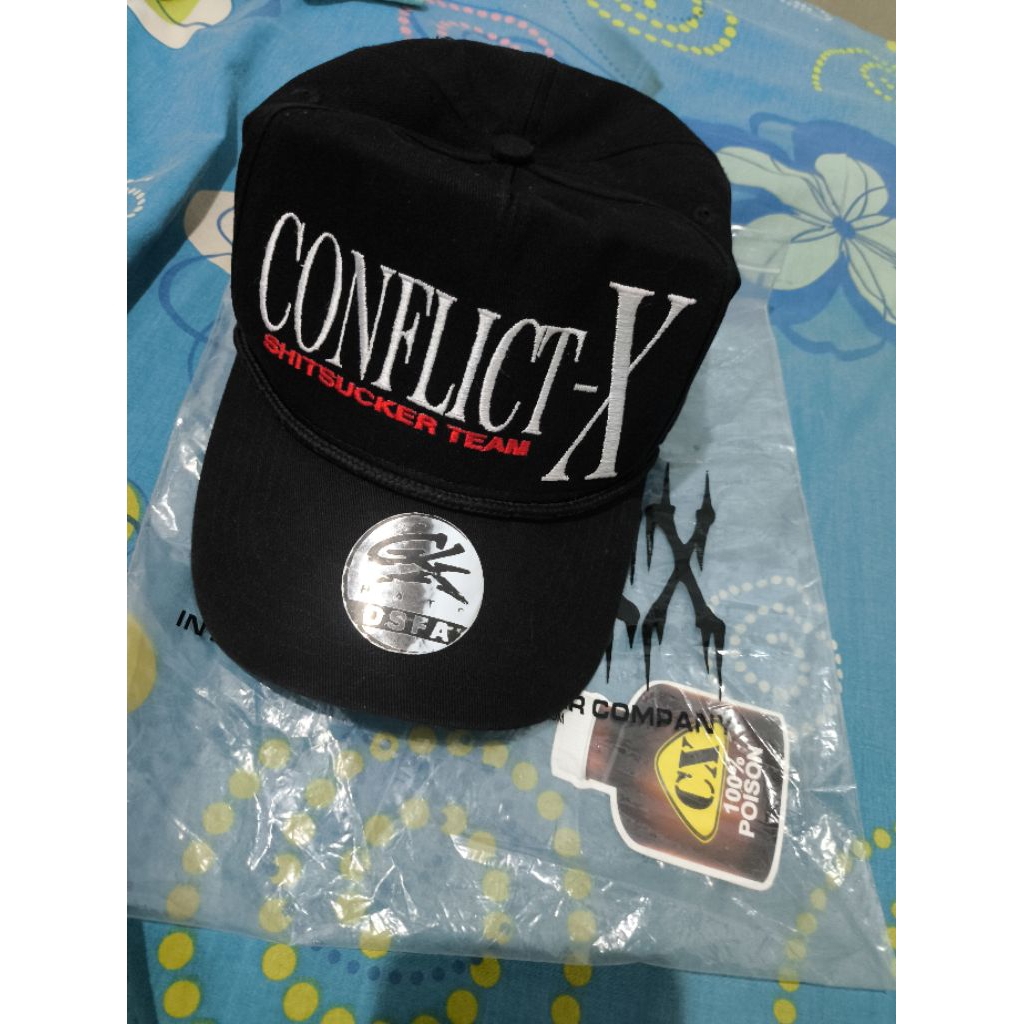 topi conflict x