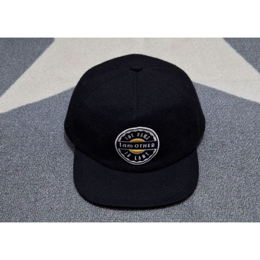 topi six panel wool uniqlo bekas original preloved