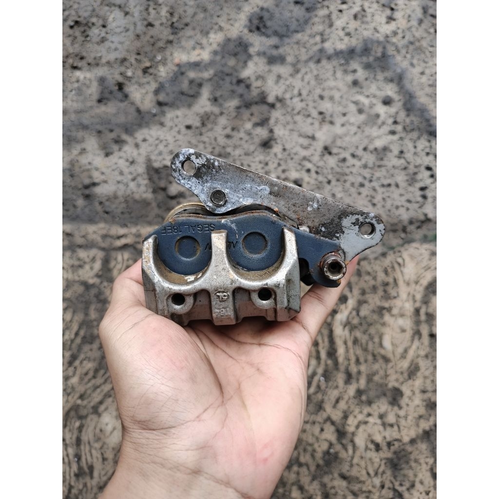 Kaliper pala babi cakram SUPRA X 125, KARISMA original copotan