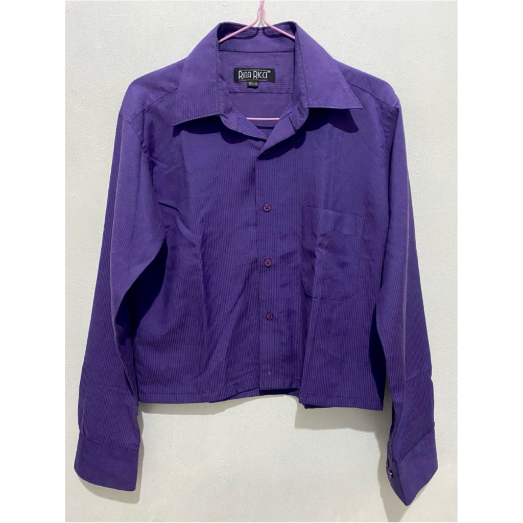 rita ricci purple shirt