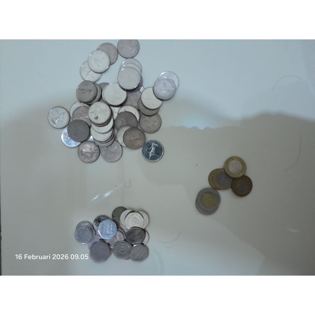 koin dirham dan riyal