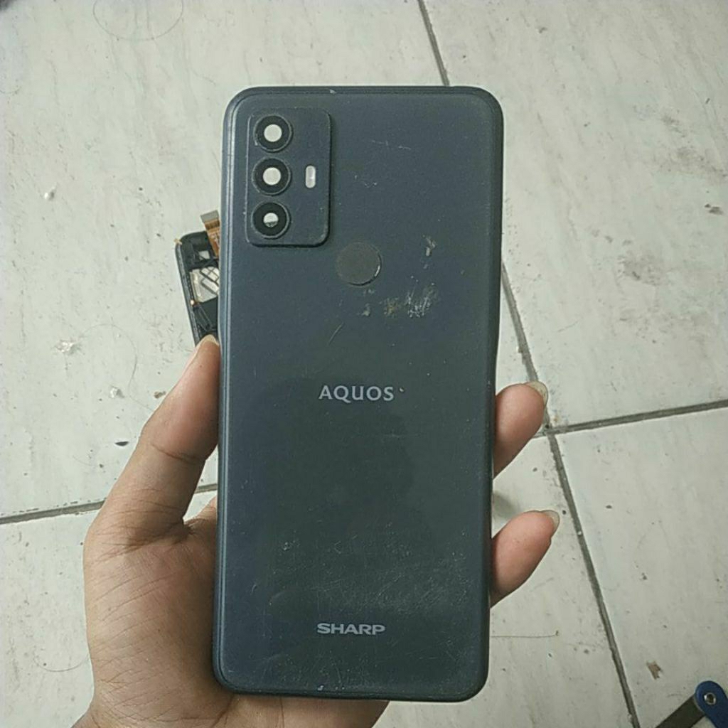 backdoor bekas Sharp Aquos V6 Plus,tombol lengkap minus kaca baret/retak