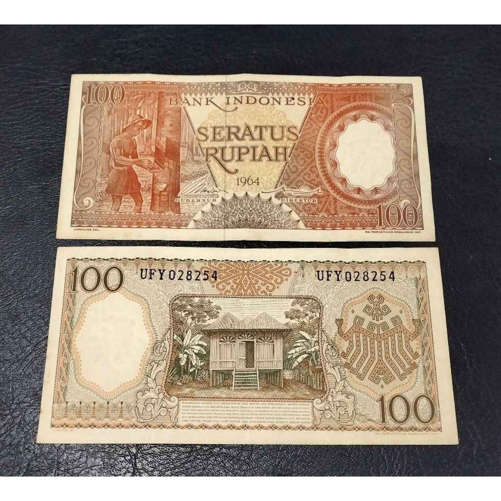 Uang kuno 100 Rupiah pekerja th 1964