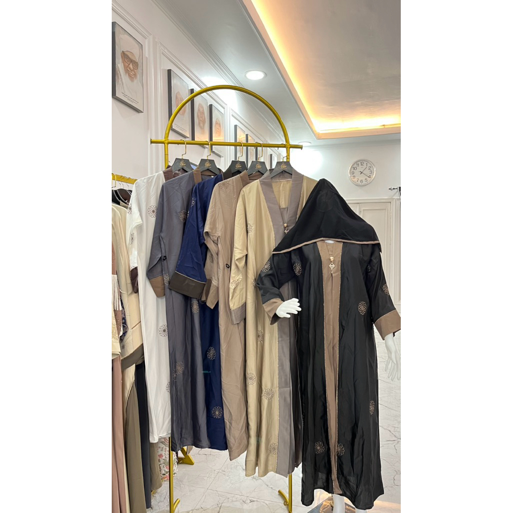 abaya motif bunga matahari