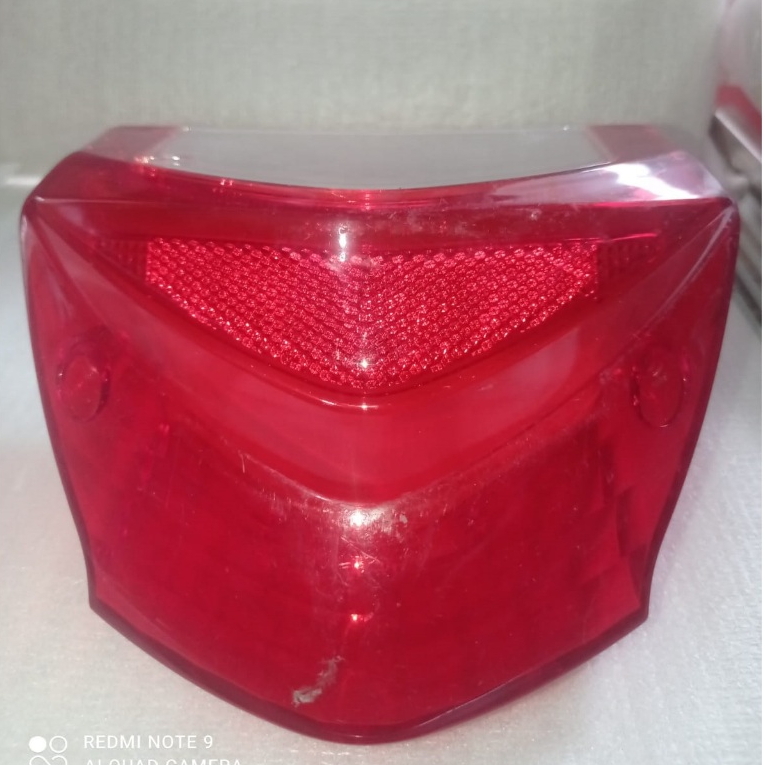MIKA LAMPU BELAKANG LENSTAIL SKYDRIVE / MIKA MERAH REM SKYDRIVE  SUZUKI ORIGINAL
