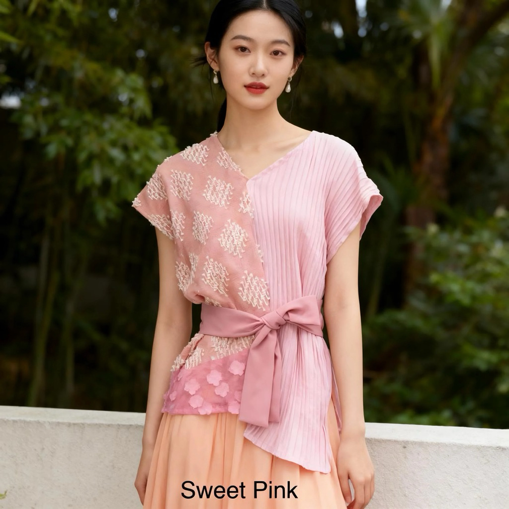 Atasan tenun sulam bulu