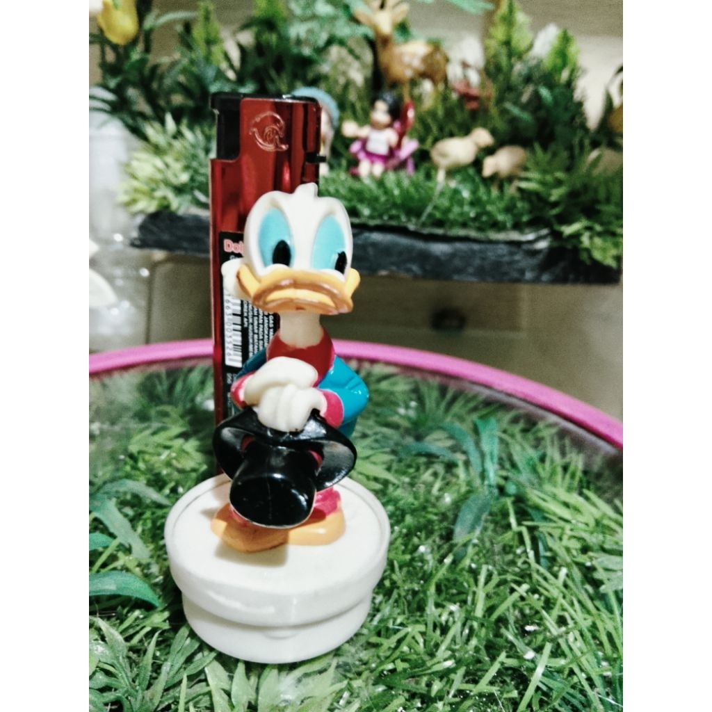 action figure Paman Gober bekas baik