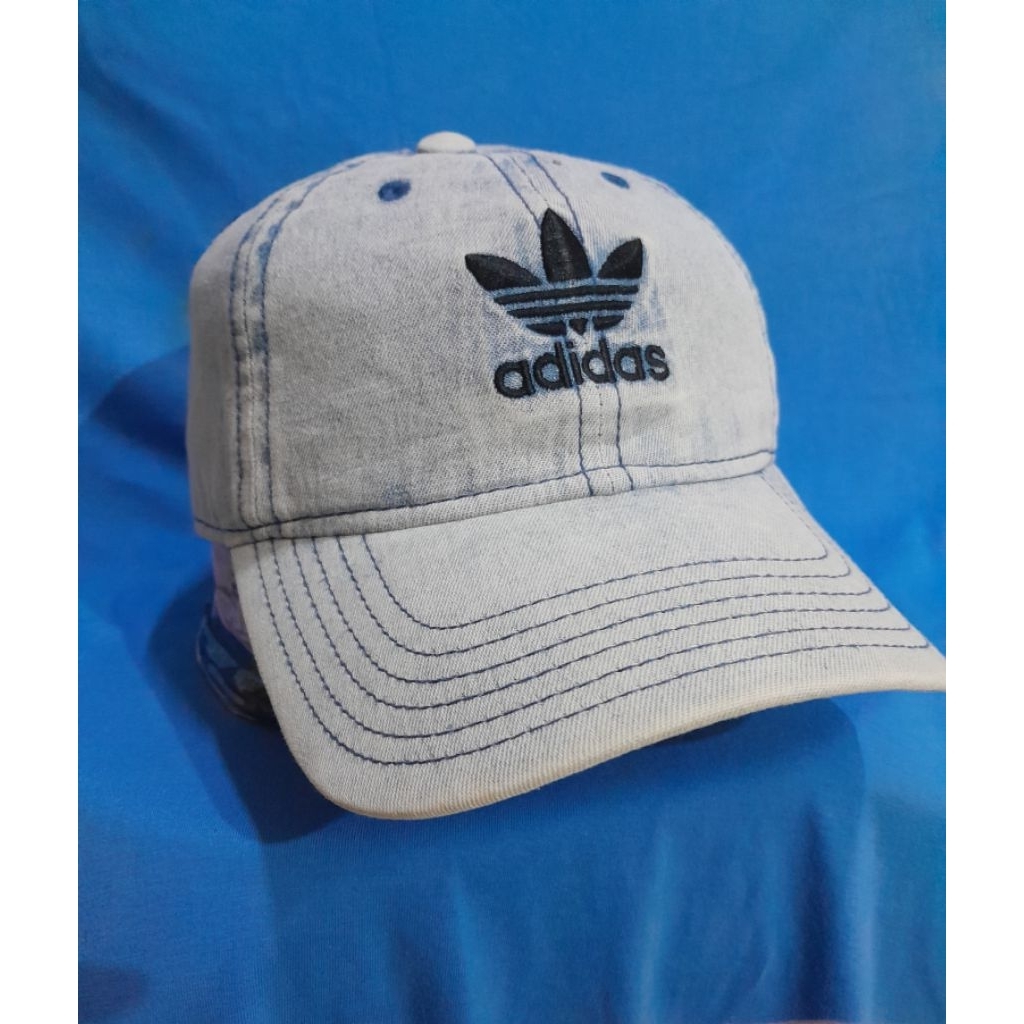 Topi adidas logo bunga