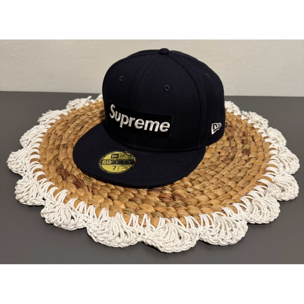 Topi new era x supreme 27time champion box logo
