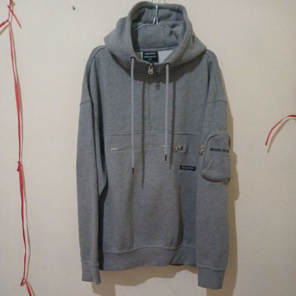 Hodie Half Zip Grooverhyme Pocket Samping