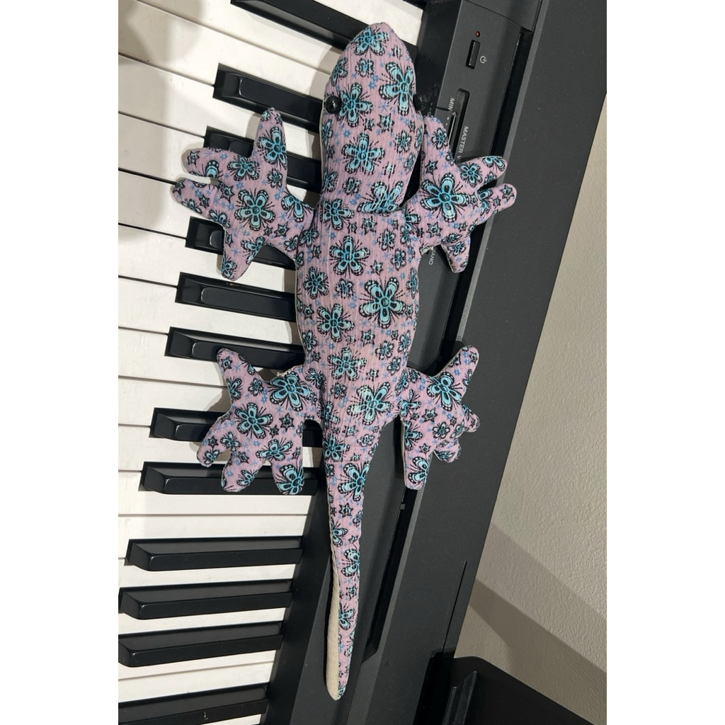 boneka pasir cicak batik