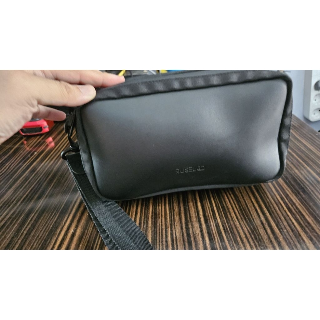 tas clutch pria rusel second like new