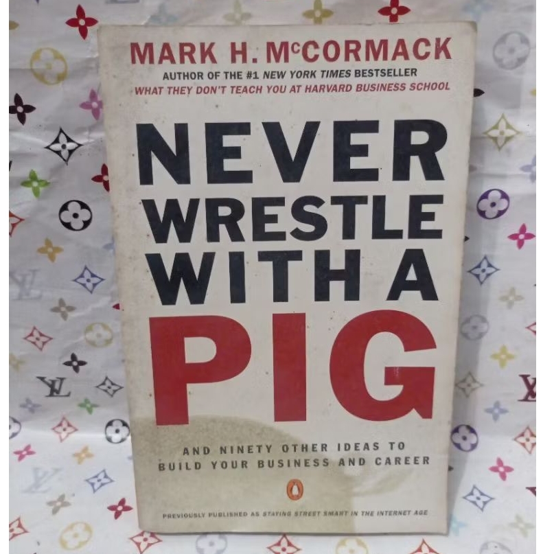 NEVER WRESTLE WITH A PIG