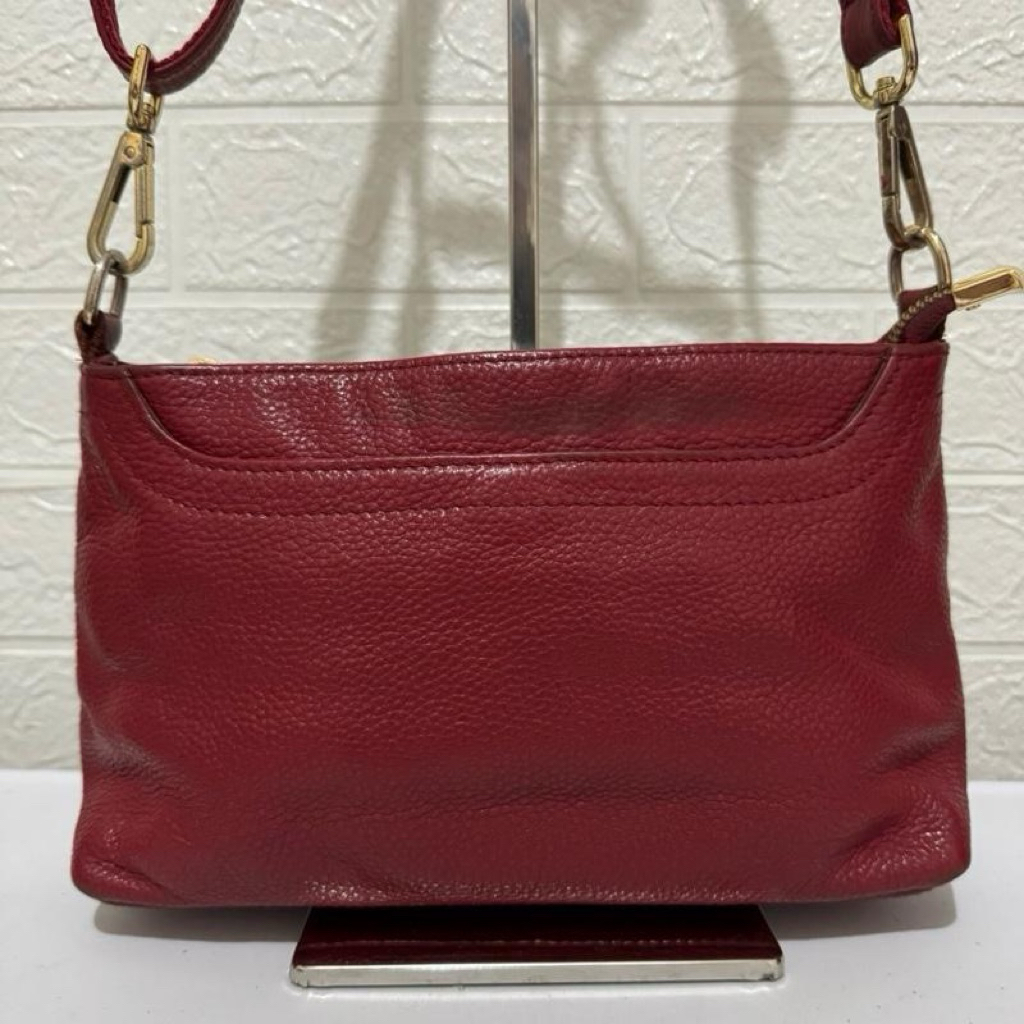 tas sling bag kulit asli. tas selempang kulit. tas ro xanne. maroon