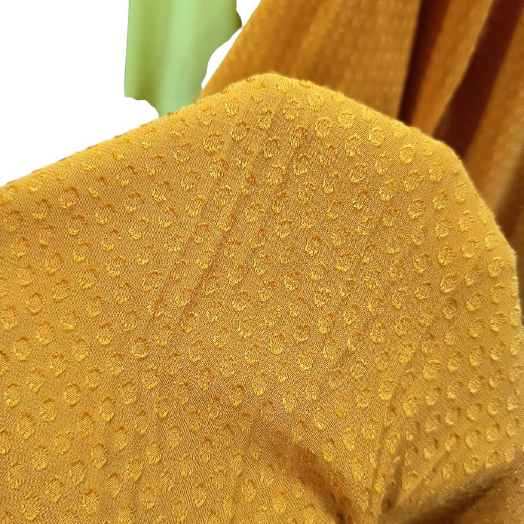 kain ceruti rubiah polos warna kuning kunyit