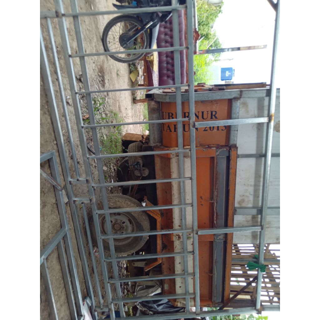 pintu gerbang lisplang serat kayu