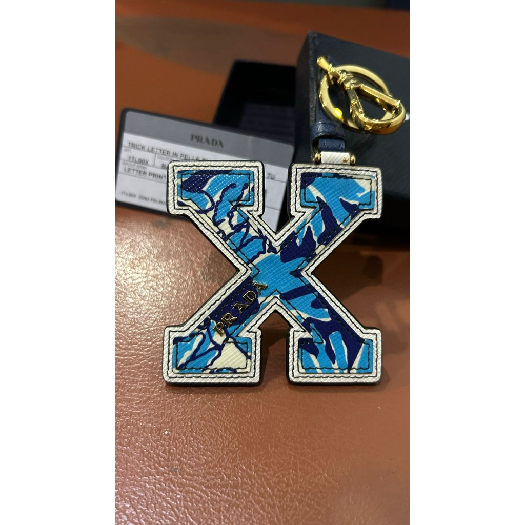Prada Letter Print ‘X’ Key Chain (Original)