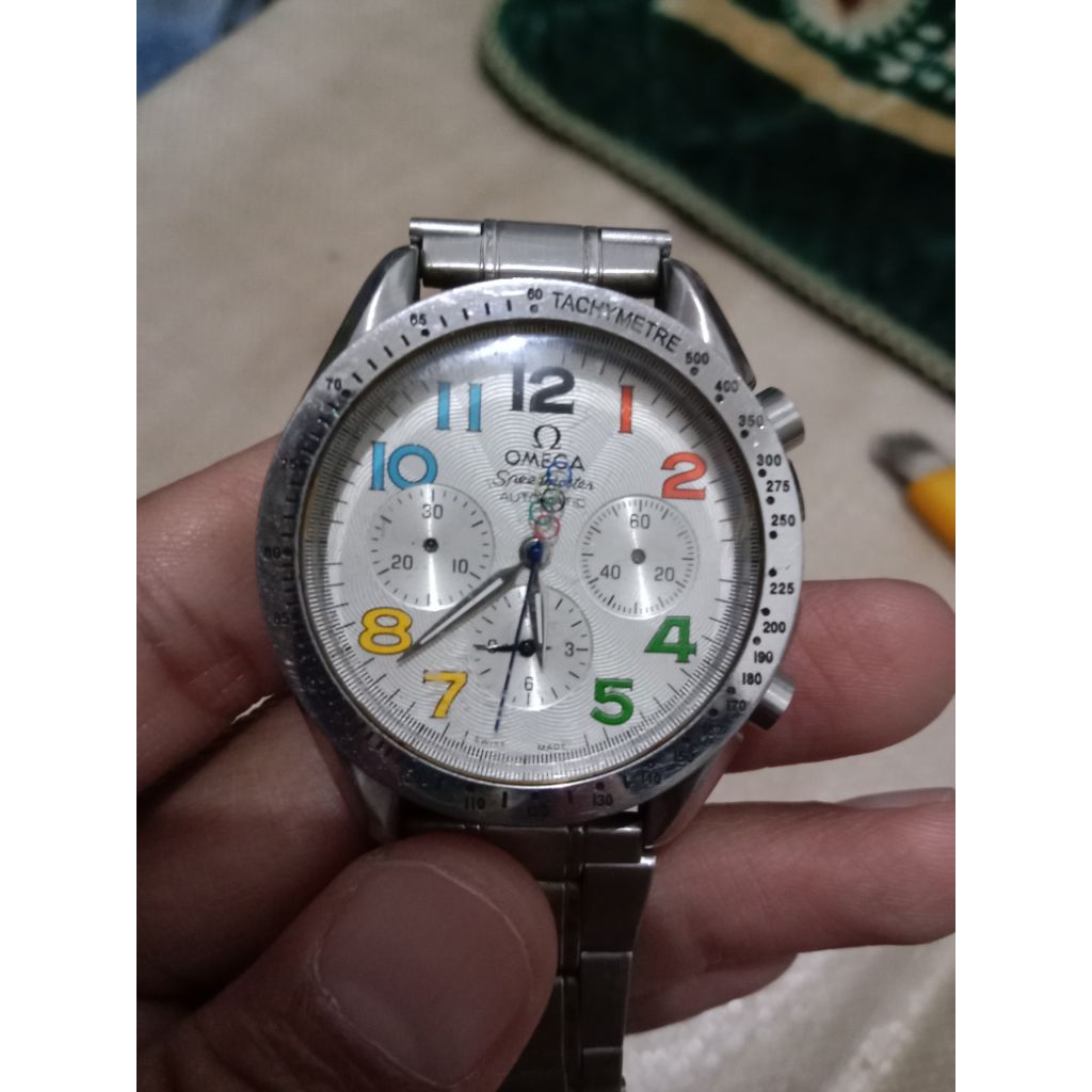 Jam tangan pria Omega otomatis seri Michael Schumacher kondisi hidup tp pemutar jam nya copot kondis