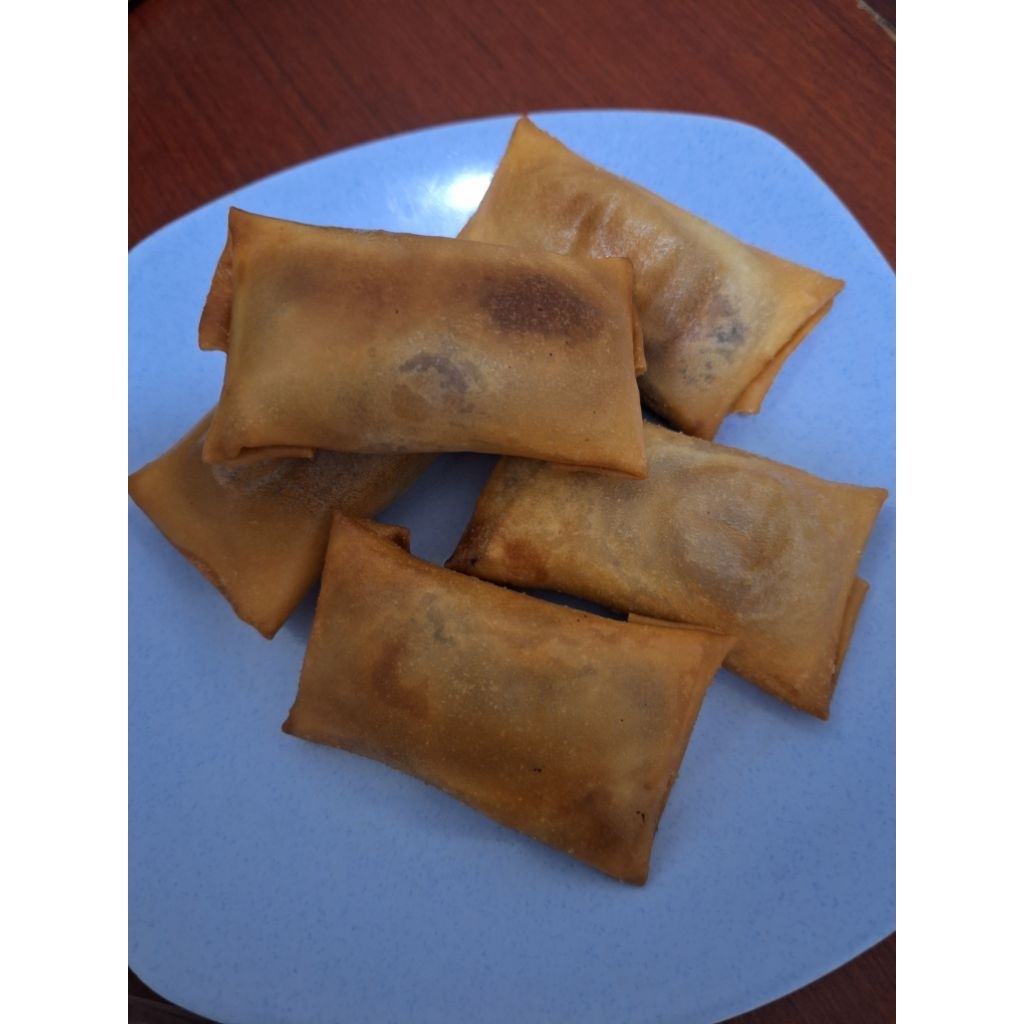 lumpia ubi ungu isi keju hrg per pc ( pake kulit fina)