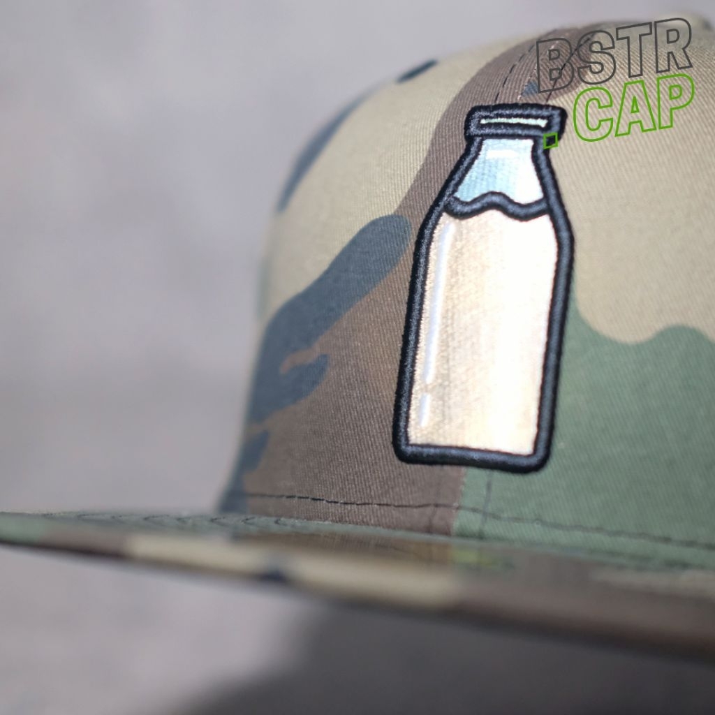 Topi fitted TORONTO MILK X NEW ERA Original camo