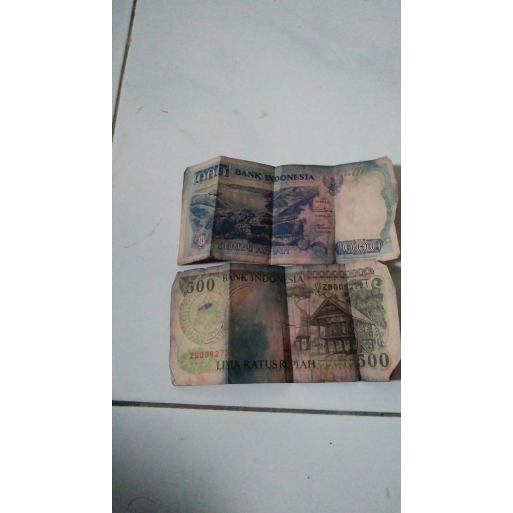 Uang kertas nominal lima ratus rupiah gambar monyet dan uang kertas nominal Seribuan Paling akurat d