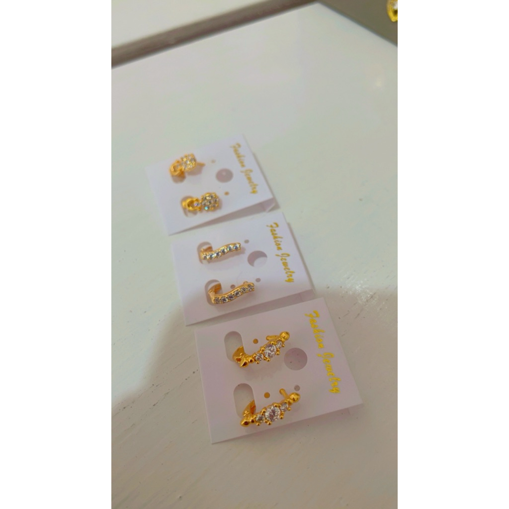 anting jepit motif emas