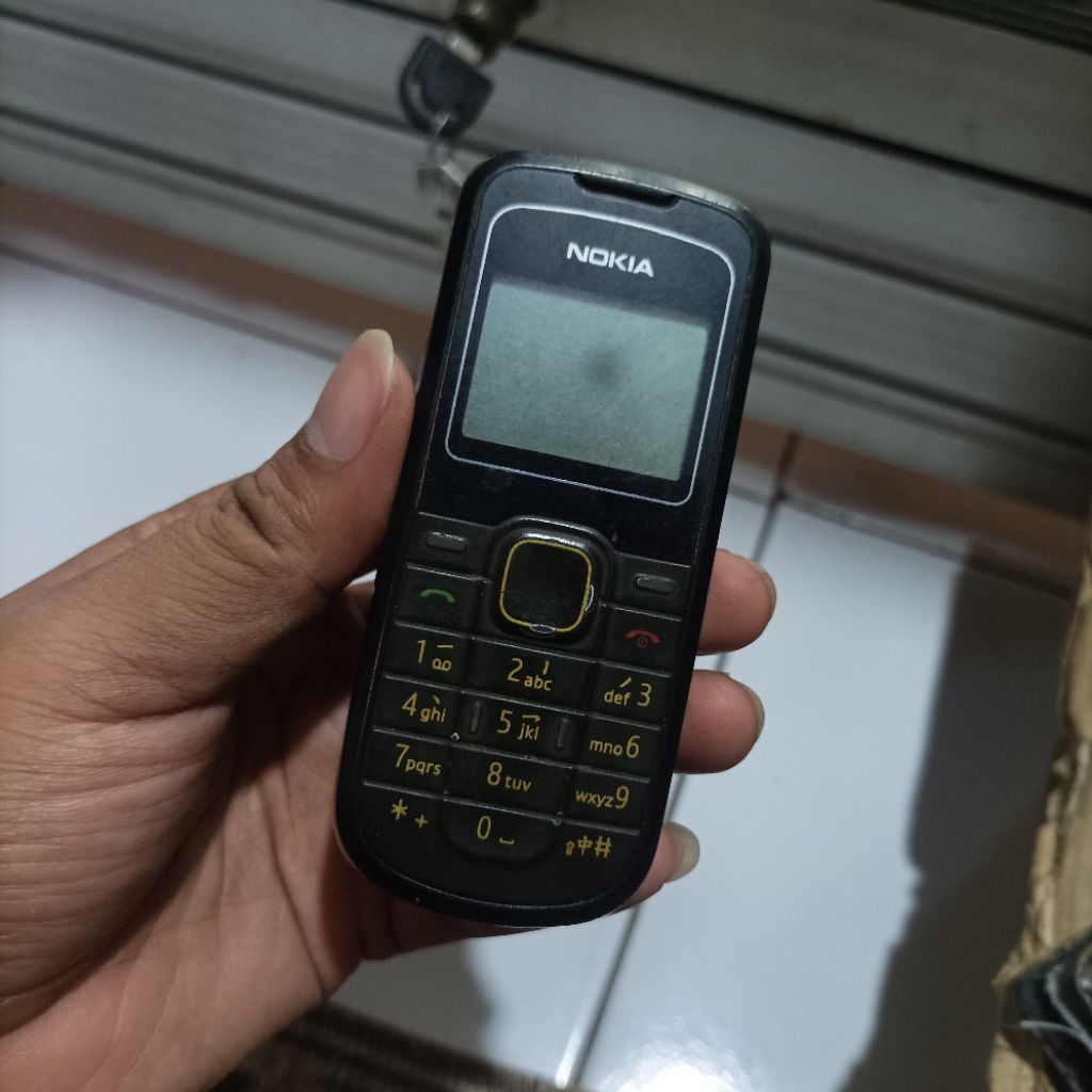 Handphone Nokia 1202 - hp bahan - mati total