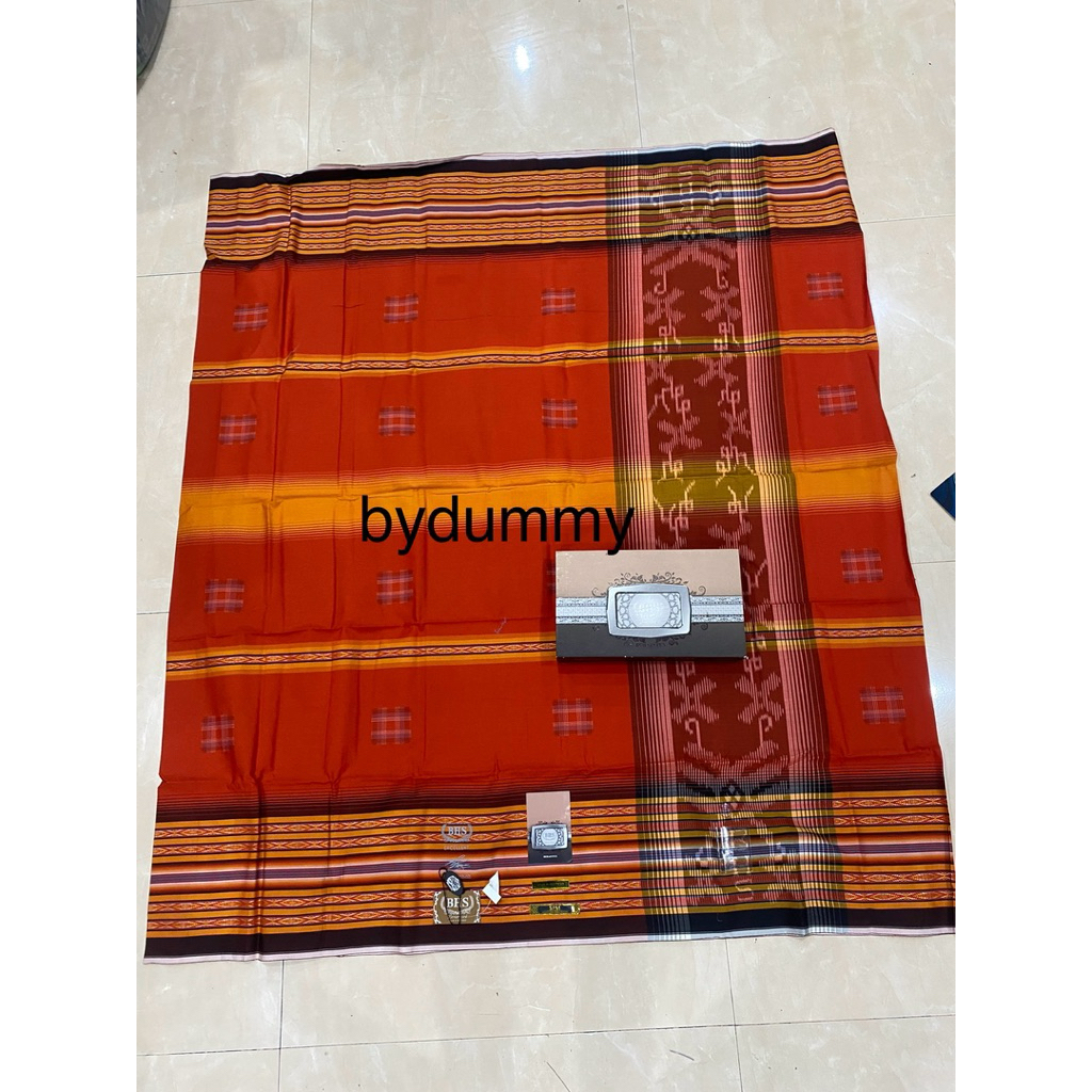 Sarung BHS Mercerized ada tanda tangan warna oranye mercerized cotton timbul motif songket pancingan