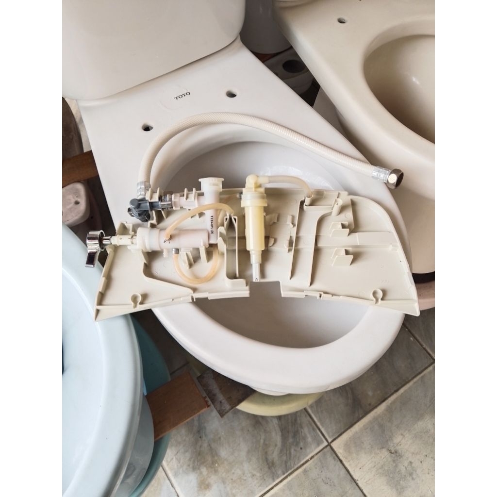 sparepart tutup ecowasher toto / mesin tutup ecowasher toto TCW07S