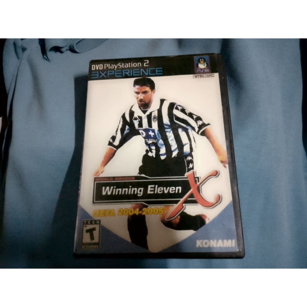 kaset PS2 second dengan cover plastik hitam