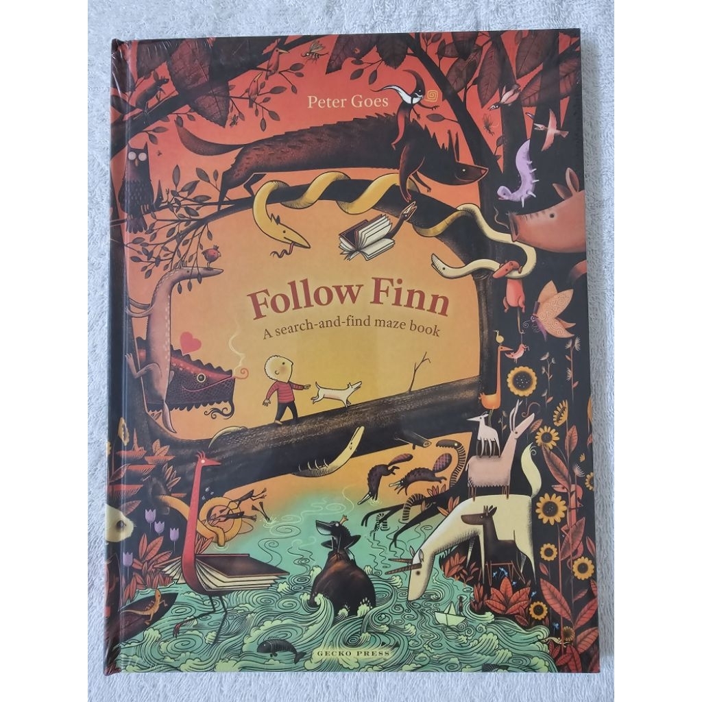 Follow Finn : A Search and Find Maze Book