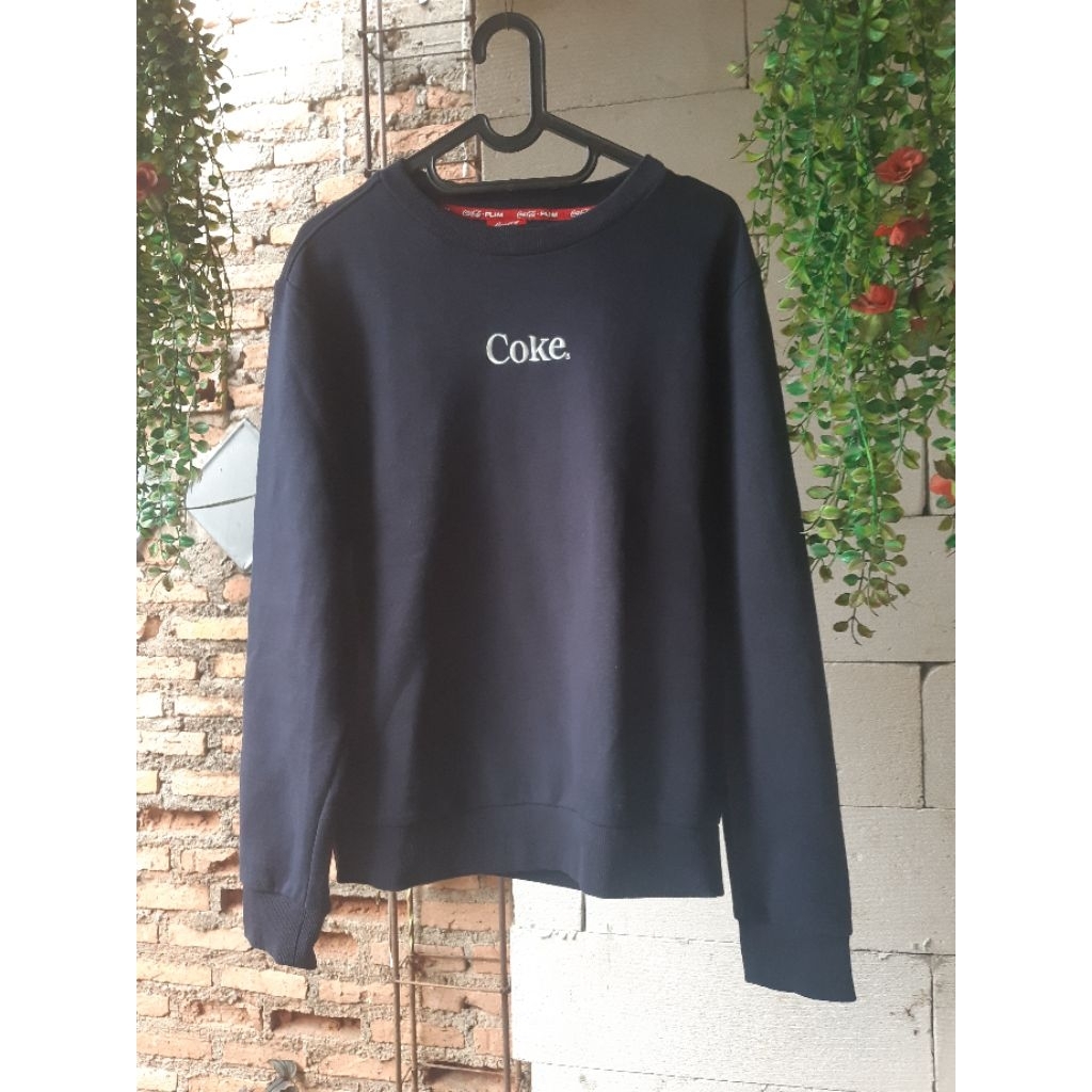 sweater coca cola