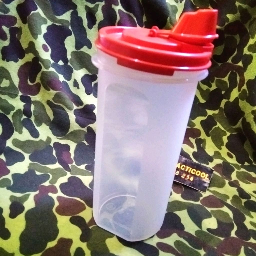 tupperware botol 650ml wadah serbaguna tuppy tempat susu botol minum botol minyak wadah kecap santan