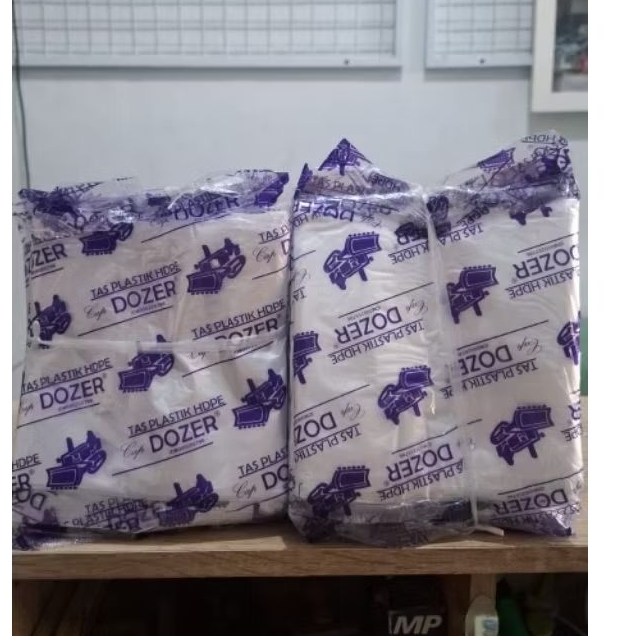 plastik kantong plastik kresek bening Dozer ungu uk. 15 kuat