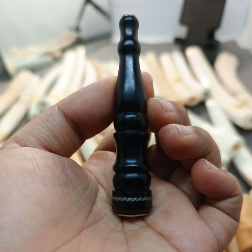 once kayu kelor hitam