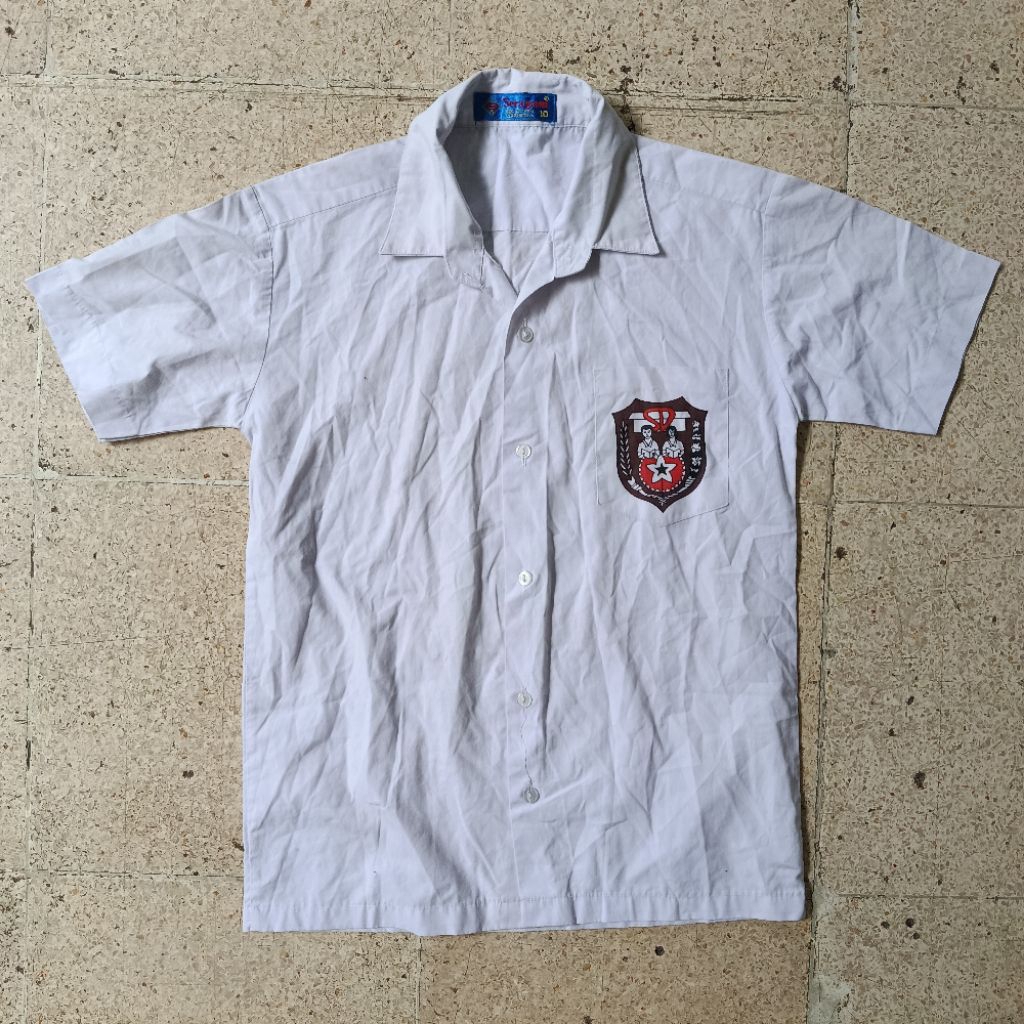 PL baju sekolah putih merk seragam  / strike 34