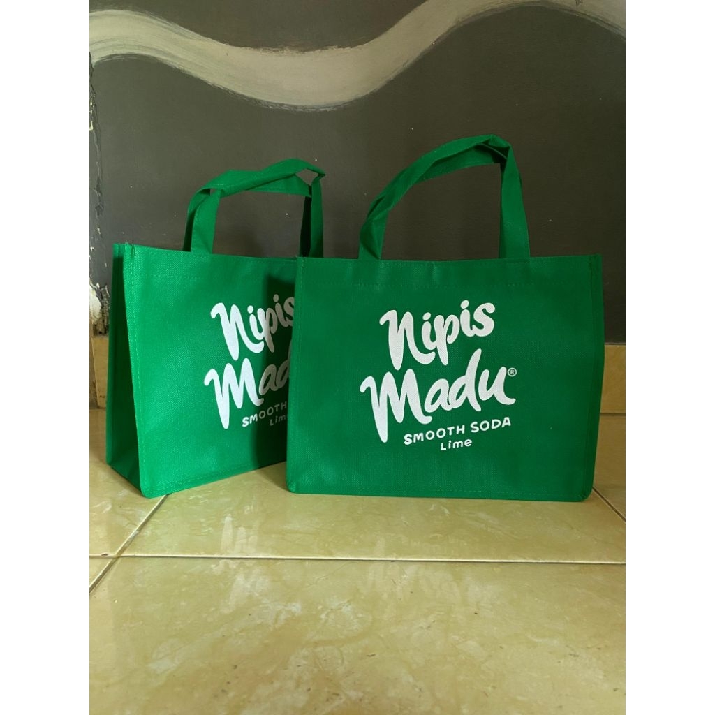 tas promosi ukuran P 27xT 22xL 10/tas hajatan/tas spunbond/tas furing