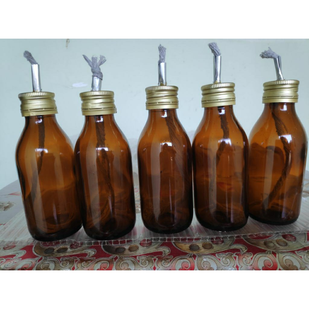 Botol pelita lentera persiapan bencana pengganti lilin dengan sumbu kompor yang dibuat khusus sehing