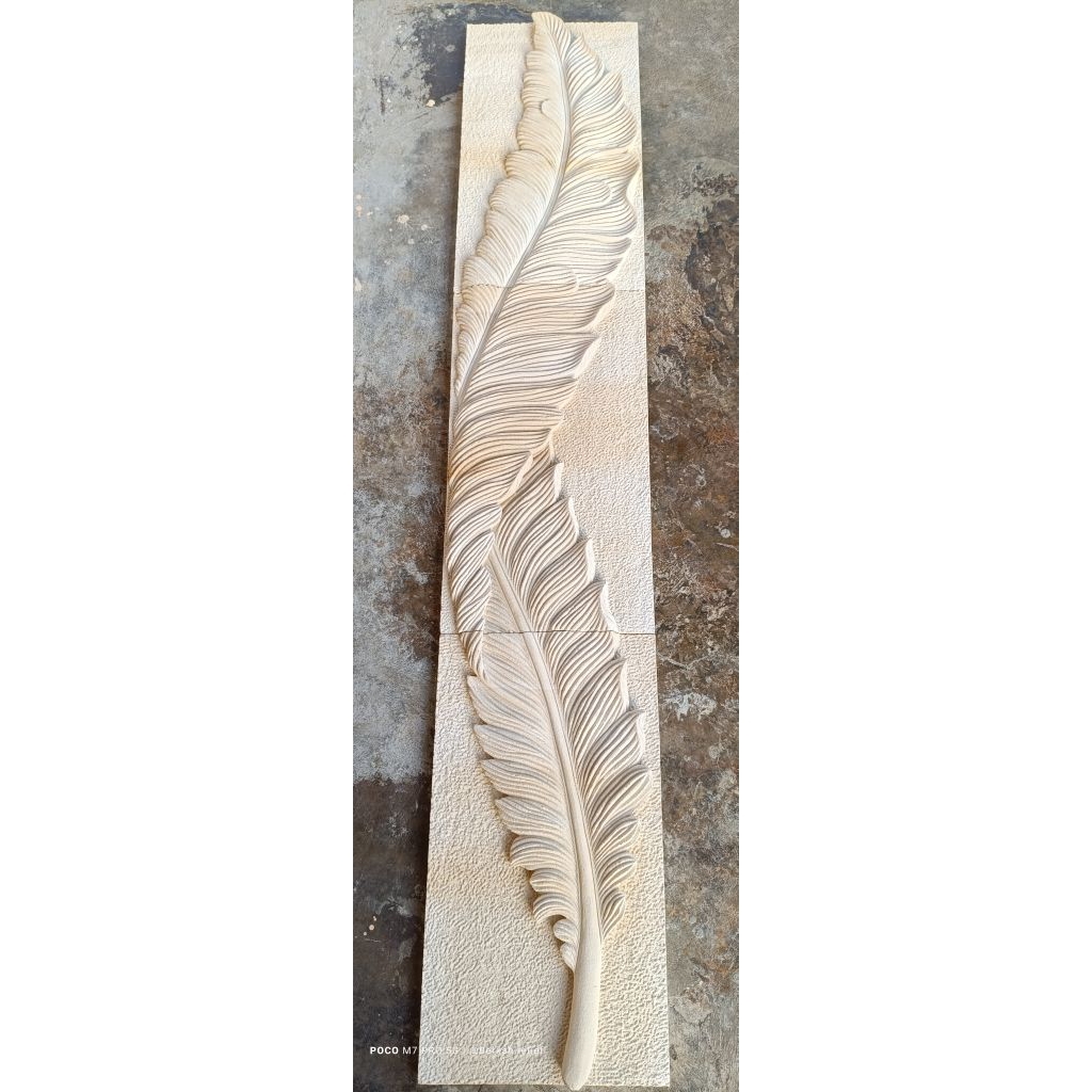 relief ukir batu alam minimalis