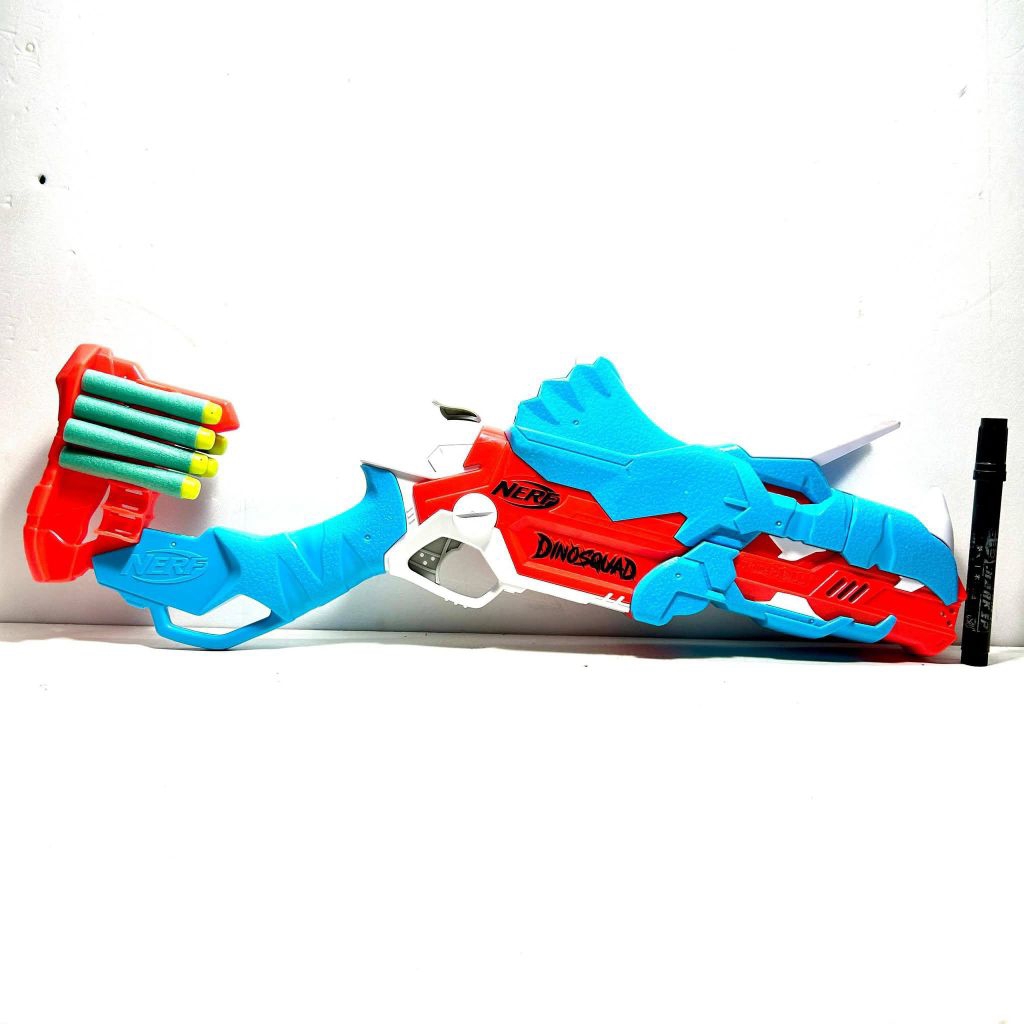 Mainan pistol nerf Features a Triceratops dinosaur design.Has break-open barrel loading; pushing the