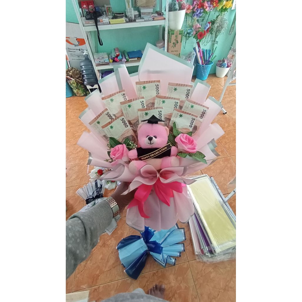 BUKET WISUDA UANG MAINAN