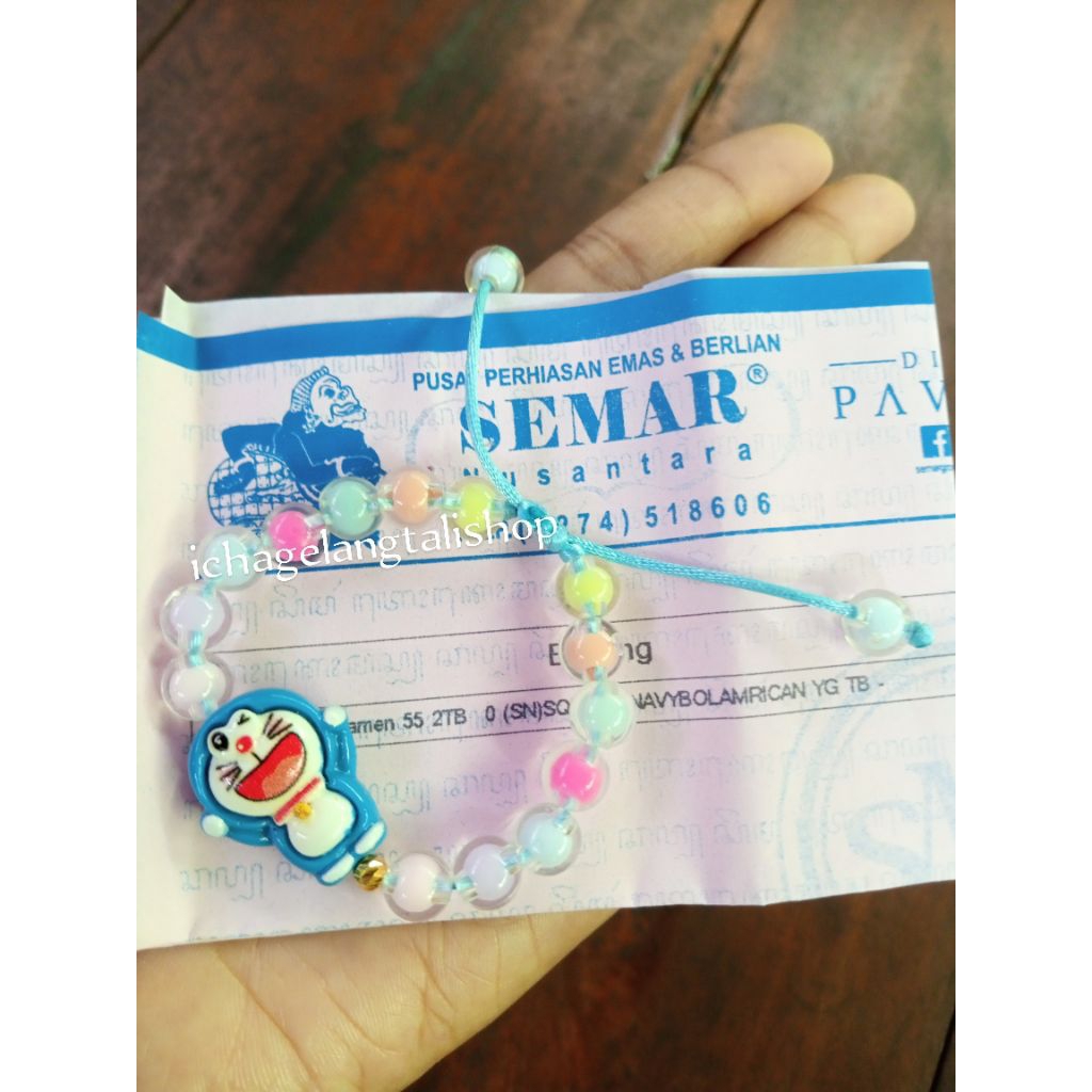 gelang anak Doraemon mrican 0, 1 gram semar nusantara ya