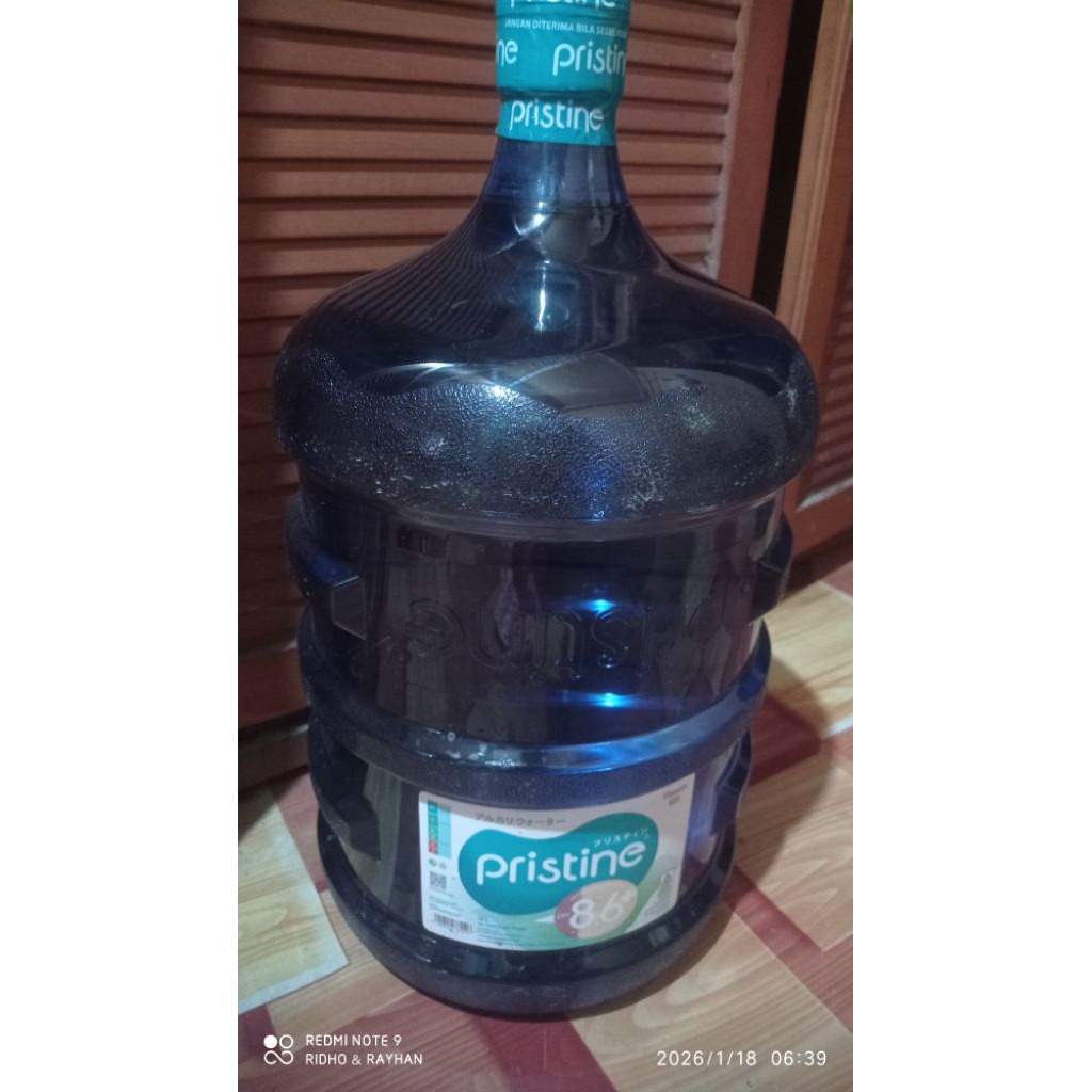 pristine air isi ulang + galon kosong