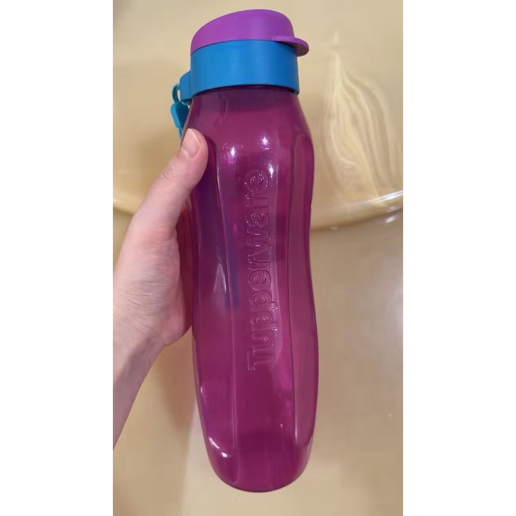 Preloved botol Tupperware ungu 1liter