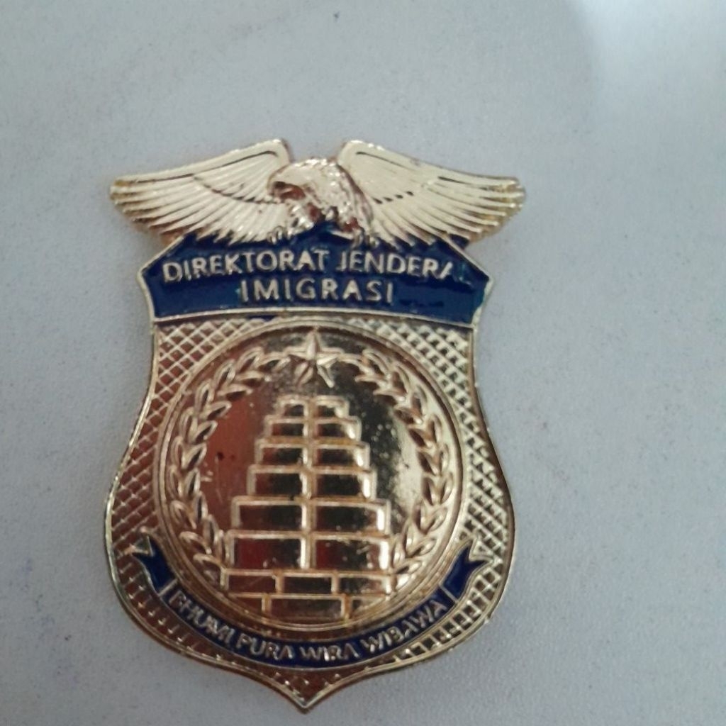 pin/brevet kewenangan imigrasi terbaru