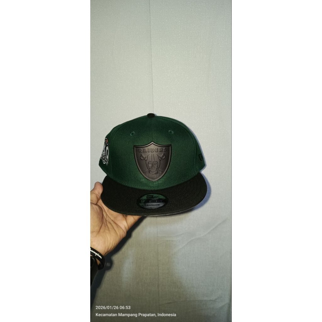 Topi New Era Raiders Metal Logo