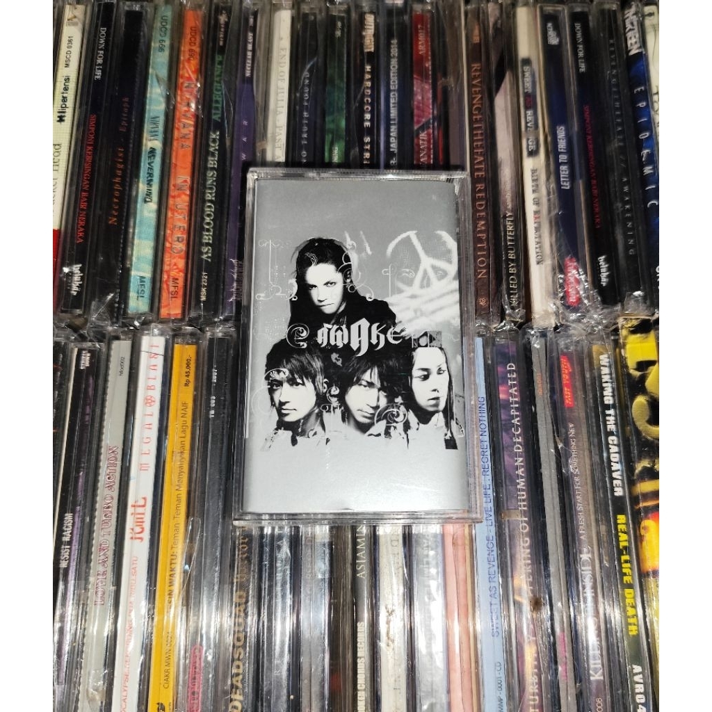 Kaset L'Arc En Ciel - Awake Hits Singles Lost Heaven