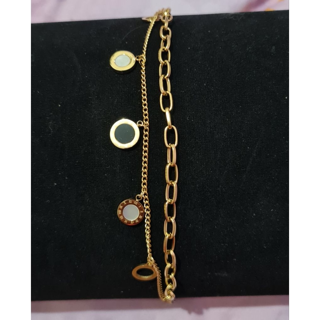 Gelang Cartier Hitam Putih berbahan titanium, stainless steel, perak