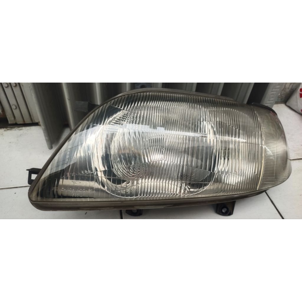 headlamp Daihatsu taruna csx 1999