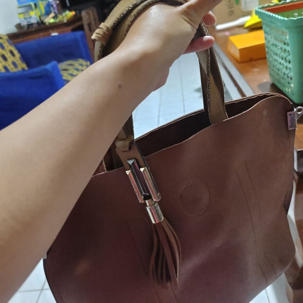 tas bekas merk bezela